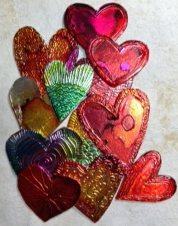 Embossed metal hearts colored with alcohol inks.